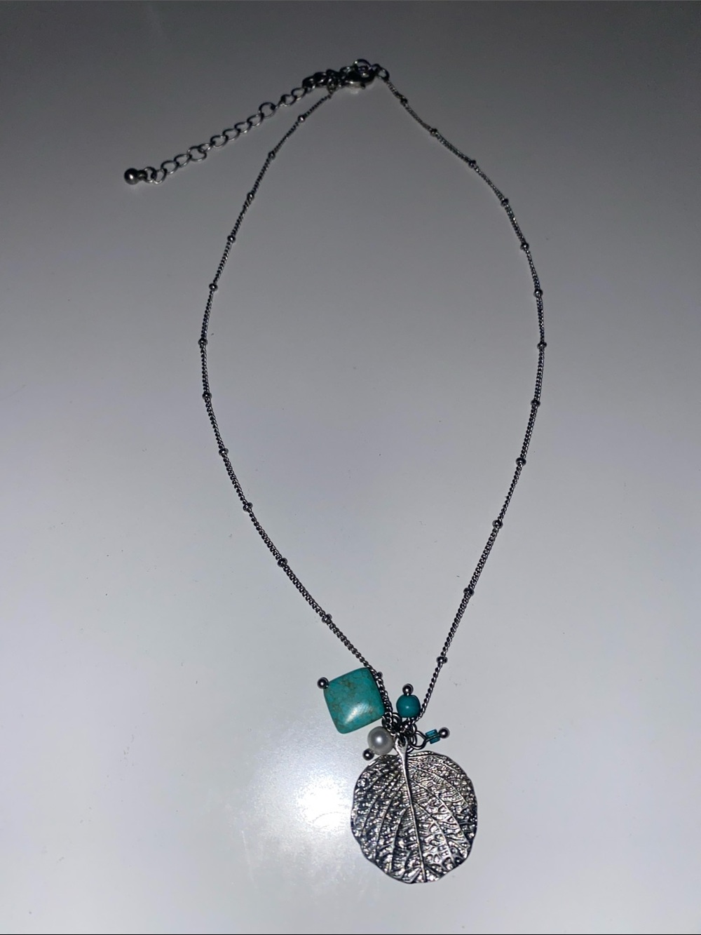 Lia Sophia Silver Leaf Pendant Necklace with Turquoise Accents